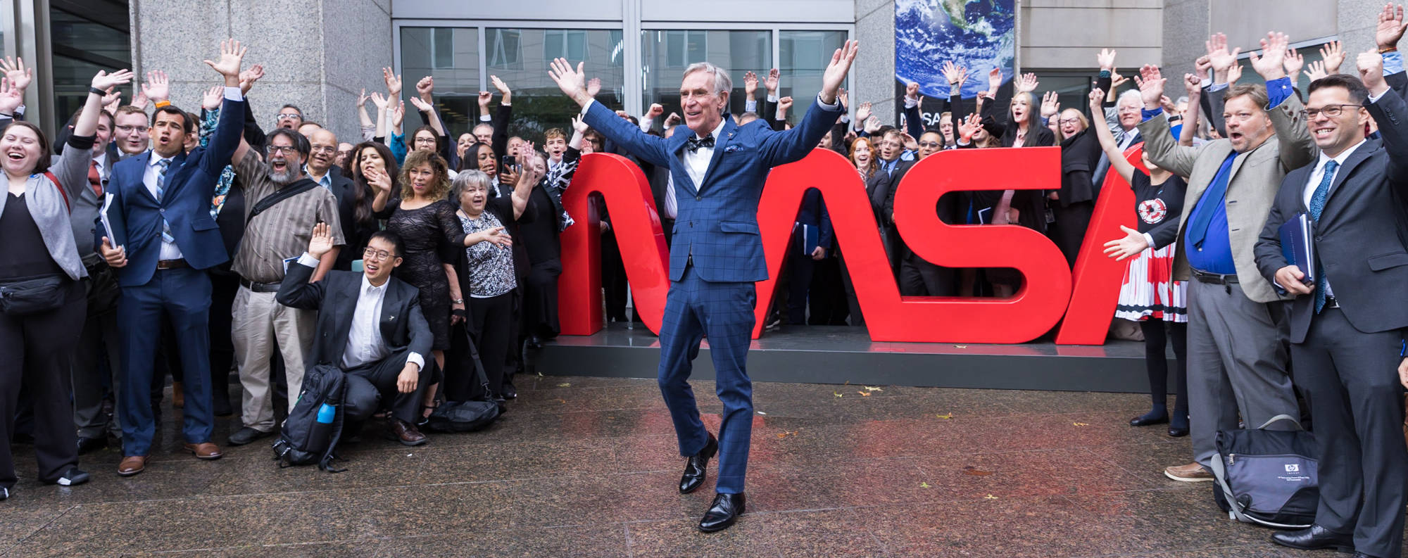 Bill Nye with Planetary Society members at NASA headquarters